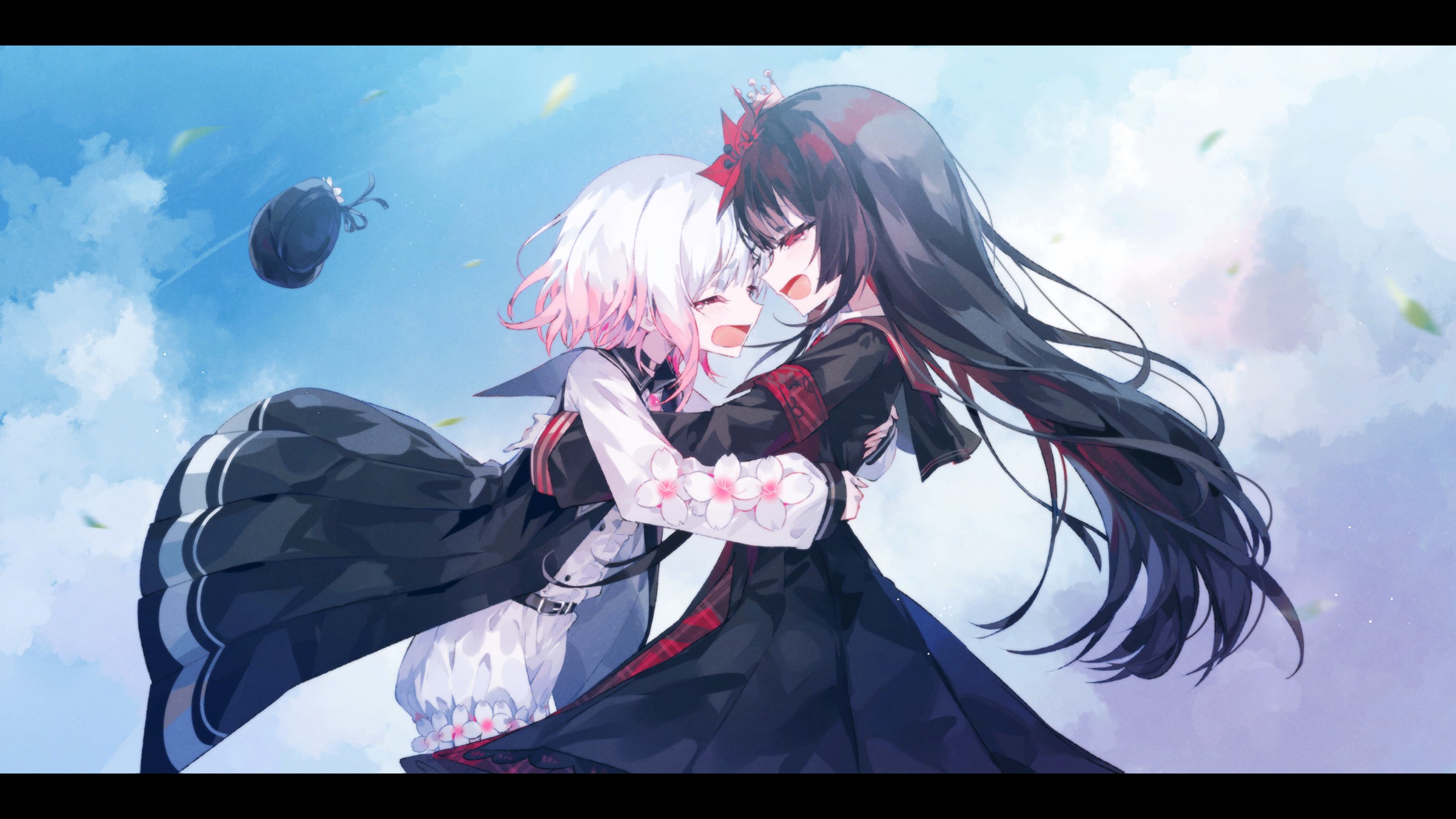 ゲーム『魔法少女ノ魔女裁判』のキャプチャー。桜羽エマと二階堂ヒロが抱擁している。